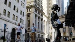 Fearless Girl statue will stay put opposite NYSE for now