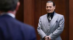 Amber Heard's lawyers interrogate Johnny Depp at libel trial