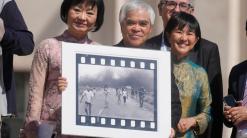 Retired AP photographer Ut gives pope 'Napalm Girl' photo