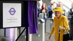Queen makes surprise appearance to mark new subway line