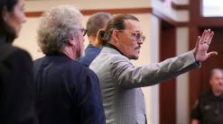 Heard's lawyers try to poke holes in Depp's libel lawsuit