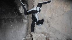 Amid the war ruins in Ukraine, Banksy seeds art