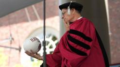 Tom Hanks urges Harvard grads to defend the truth and resist indifference