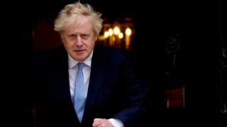UK's Johnson urges end to N Ireland deadlock, spars with EU