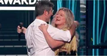 Simon Cowell and Kelly Clarkson Had a "Bloody Fantastic" Reunion at the Billboard Awards