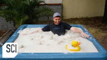A Hot Tub Filled with Liquid Sand | Outrageous Acts of Science