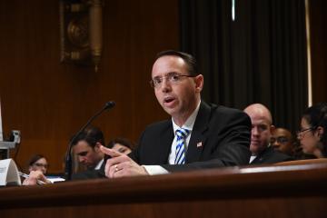 DOJ’s Rosenstein: Regulators Can’t Let Criminals ‘Hide Behind’ Crypto