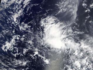 NASA sees development of Tropical Depression 03W near Yap