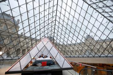 You could win a chance to sleep in the Louvre with Airbnb