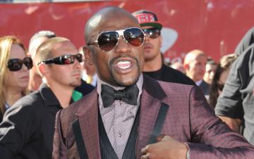 Floyd Mayweather, DJ Khaled Escape Lawsuit Brought By ICO Investors