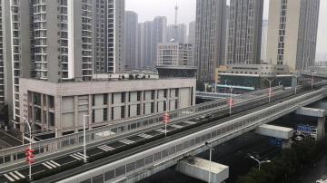 Social controls, SARS experience help China close off cities