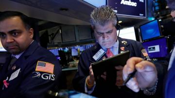 Stocks wobble in early trading as investors turn cautious