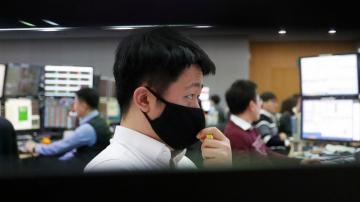 Global markets slide again on enduring concern over virus