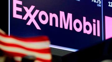 Exxon to cut activity in Permian Basin as oil prices plummet