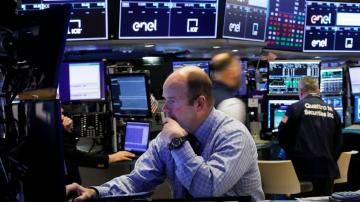 Stocks drop in US, Europe as virus worries dominate again