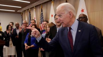Biden invokes Obama, swipes at Sanders with six-state ad buy