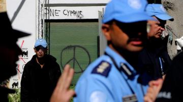 Cyprus police pepper spray protesters at shut crossing point