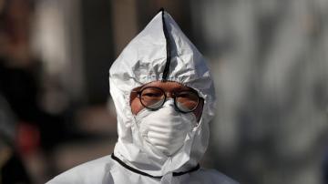 Asia urges vigilance to keep hard-won gains against virus