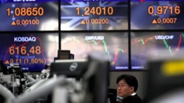 Asian shares mostly higher, lockdown feud drags Tokyo lower