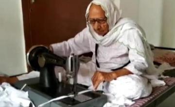 This 98-Year-Old Corona Warrior From Punjab Stitches Masks For The Needy