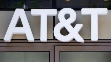 Virus dings AT&T results, telecom withdraws year guidance