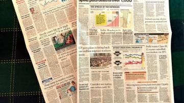 Indian news media fight virus on financial, political fronts