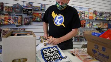 Socked by virus, comic book industry tries to draw next page