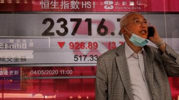 Markets drop in Asia on rising China-US tensions over virus