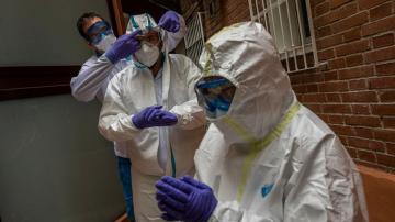 AP PHOTOS: Spanish ambulance workers fear virus rebound