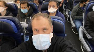Images of fuller flights amid COVID-19 pandemic renew calls for federal action
