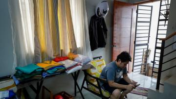 AP PHOTOS: Recovered Filipino doctor back helping patients