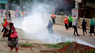 Bangladesh garment workers clash with police over wages