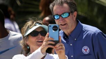 Critics chide Virginia governor for mask-less beach visit