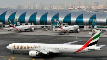 Long-haul carrier Emirates says it fires staff amid virus