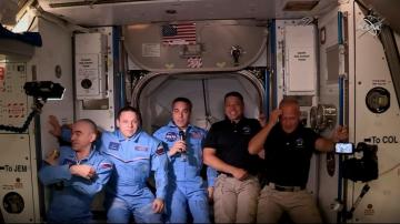 Dragon docks at International Space Station 19 hours after NASA-SpaceX launch
