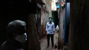 Amid virus, those in India's largest slum help one another