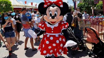 Hong Kong Disneyland reopens, consumers using less cash
