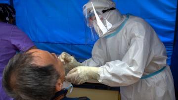 The Latest: Switzerland quarantines 300 in club infection