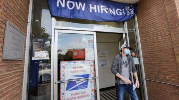Demand for jobless aid high, even as economy slowly picks up