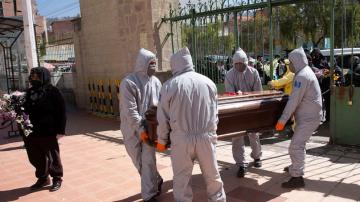Bolivia police recover 420 dead in possible COVID-19 cases