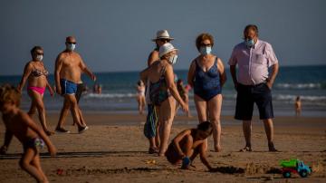 Spain takes aim at nightclubs and beaches as virus rebounds