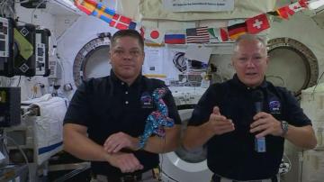 History-making astronauts undock from ISS, return set for Sunday
