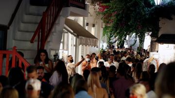 Bar owners on Greek island angry over virus restrictions