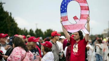 Facebook bans some, but not all, QAnon groups and accounts