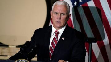 After Trump praise, Pence decries QAnon 'conspiracy theory'