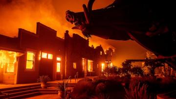 Raging wildfires again threaten California wine country
