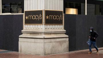 Macy's swings to loss in second quarter but tops estimates
