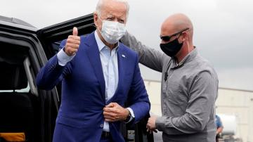 AP FACT CHECK: Biden’s auto hype, Trump’s false drug pledge