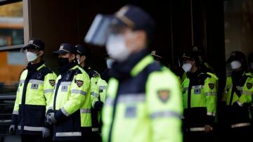 The Latest: Hong Kong raid leads to 100K counterfeit masks