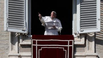 Pope returns to private library for audience as virus surges